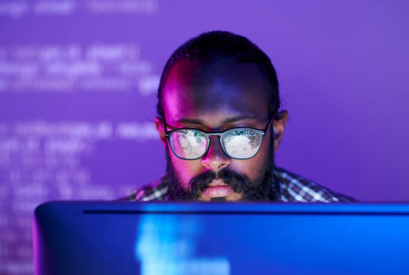 man working on laptop